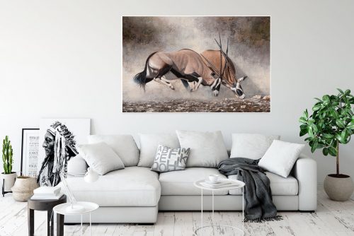 Clashing of horns over white couch on light wall copy